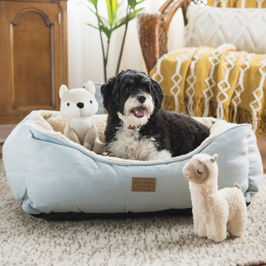 Harry Barker Chambry Sherpa Cuddler Bed featuring a soft, cozy sherpa lining and chambray fabric, designed to provide ultimate comfort and warmth for your dog.